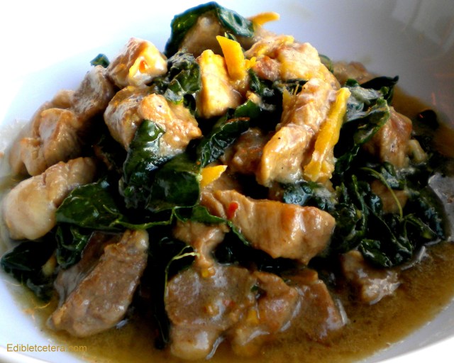 Pork braised in coconut milk with ginger, fish sauce & kale